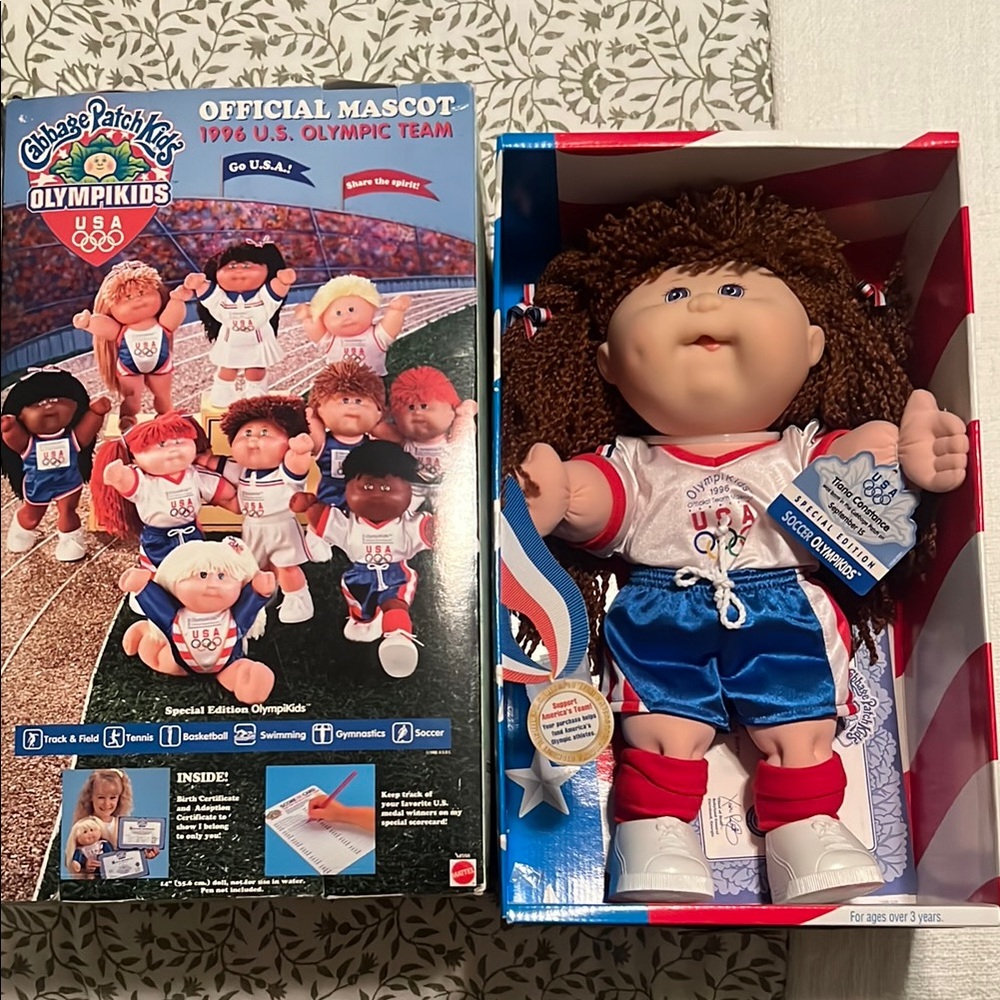 Brown and White Doll with Accessories